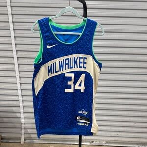 Blue Basketball Jersey with Cream and Green Accents Milwaukee